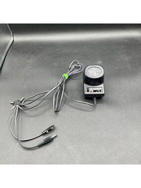 Deluxe Universal AC/DC Adaptor Model QA-223 Multi-Voltage 1.5V-12V 300mA ✅
